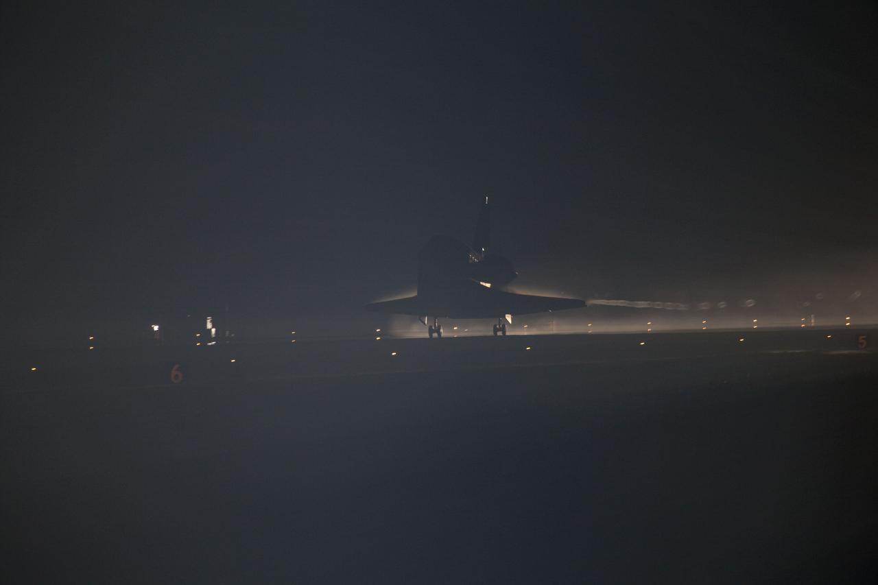 STS135-S-169 (21 July 2011) --- Xenon lights guide space shuttle Atlantis down on the Shuttle Landing Facility's Runway 15 at NASA's Kennedy Space Center in Florida for the final time. Securing the space shuttle fleet's place in history, Atlantis marked the 26th nighttime landing of NASA's Space Shuttle Program and the 78th landing at Kennedy. Main gear touchdown was at 5:57:00 a.m. (EDT) on July 21, 2011, followed by nose gear touchdown at 5:57:20 a.m., and wheelstop at 5:57:54 a.m. Onboard are NASA astronauts Chris Ferguson, STS-135 commander; Doug Hurley, pilot; Sandy Magnus and Rex Walheim, both mission specialists. On the 37th shuttle mission to the International Space Station, STS-135 delivered more than 9,400 pounds of spare parts, equipment and supplies in the Raffaello multi-purpose logistics module that will sustain station operations for the next year. STS-135 was the 33rd and final flight for Atlantis, which has spent 307 days in space, orbited Earth 4,848 times and traveled 125,935,769 miles. Photo credit: NASA