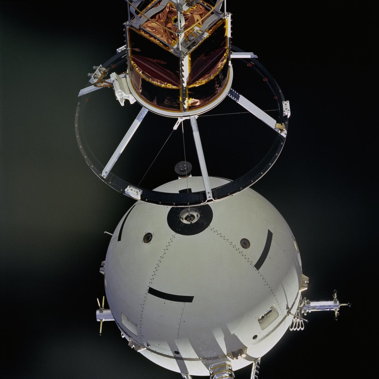 STS046-73-052 (4 Aug 1992) --- A 70mm handheld camera was used by the crew members to capture this medium close-up view of early operations with the Tethered Satellite System (TSS). The sphere can be seen moving away from the ring structure on the boom device in the Space Shuttle Atlantis' cargo bay.