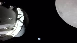 Earthset as Orion Prepares for Outbound Powered Flyby