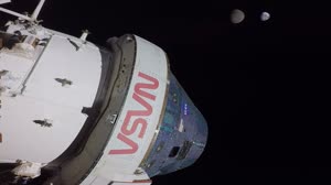 Flight Day 13: Orion Looks Back at Moon and Earth