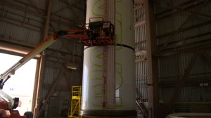 Worm Logo Painting on SLS Booster Segments