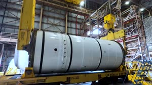 KSC-2021010-RV-FMX01-0002-Artemis_II_booster_Arrival_Processing_at_RPSF-M1761