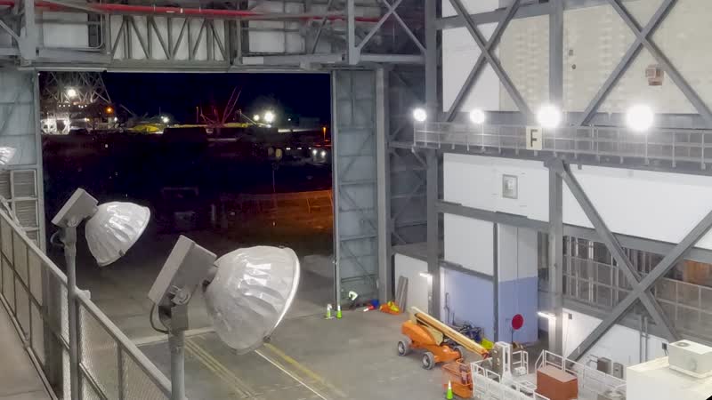 Still from “Artemis II Stacking - Booster Segment Transport from RPSF to VAB - Timelapse” on NASA Image and Video Library