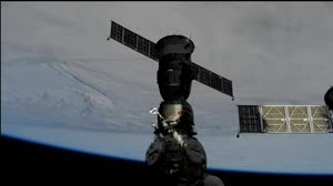 U.S. Astronaut, Crewmates Undock from the International Space Station