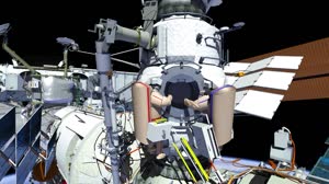 RUSSIAN COSMONAUTS CONDUCT SPACEWALK TO ACTIVATE NEW STATION ROBOTIC ARM